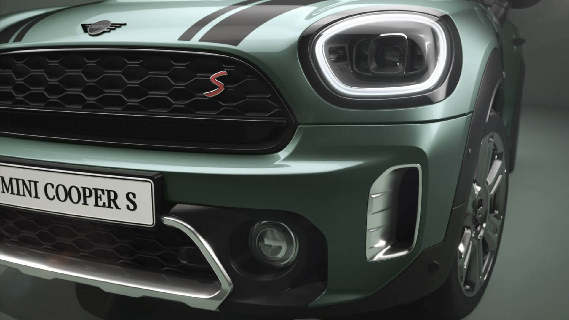 MINI Countryman – вид сбоку – зеленый и черный 